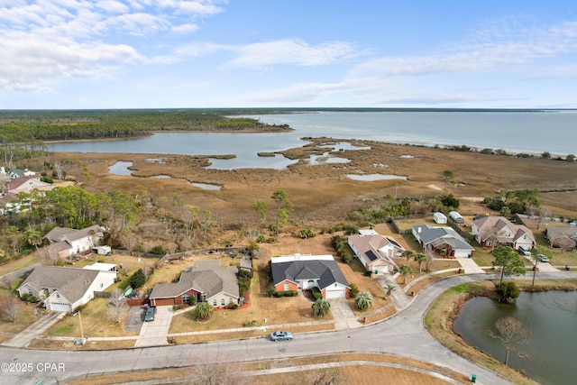 drone / aerial view featuring a water view