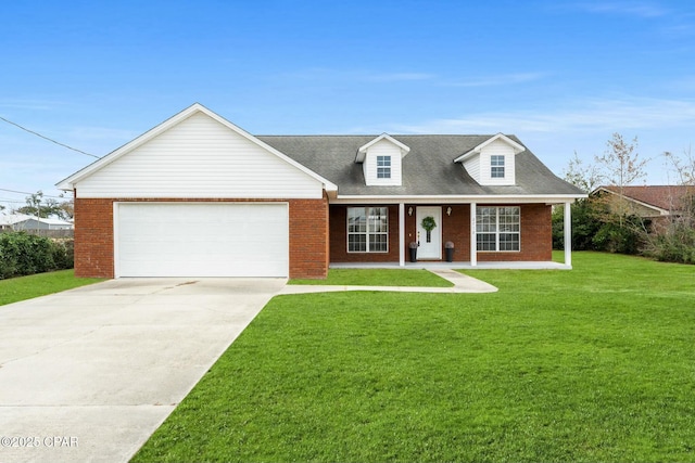 view of front of house featuring a garage and a front lawn