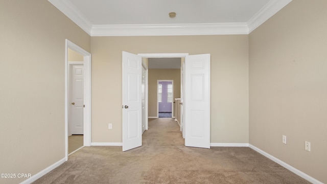 unfurnished bedroom with ornamental molding and light carpet