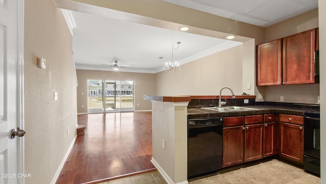 kitchen with crown molding, sink, kitchen peninsula, and black appliances