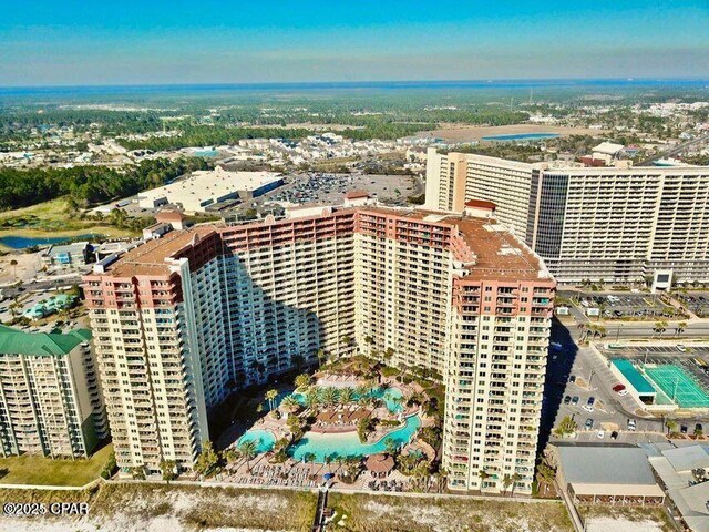 birds eye view of property with a view of city