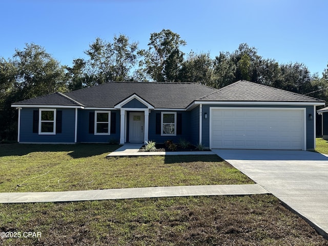 0000 Green Meadows Trl Lot 11, Marianna, FL 32446 - single story home featuring a garage, driveway, and a front lawn