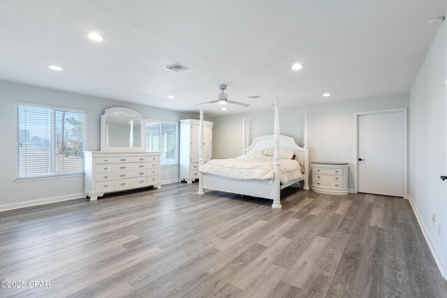 bedroom featuring ceiling fan and light hardwood / wood-style floors