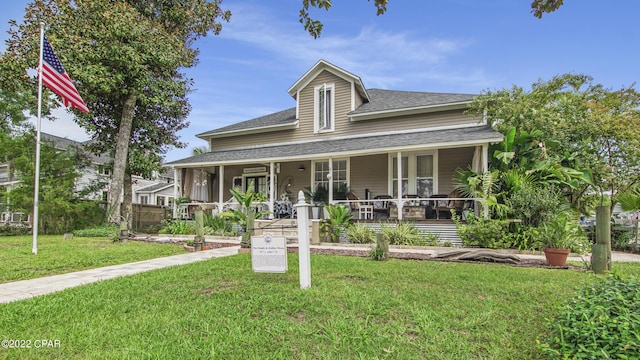 view of front facade featuring a porch and a front yard