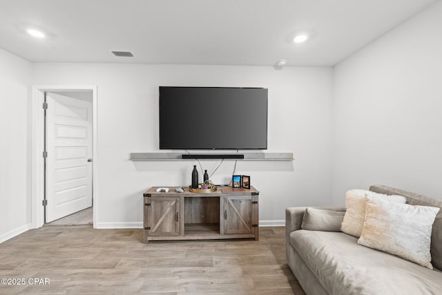 living room featuring light hardwood / wood-style floors