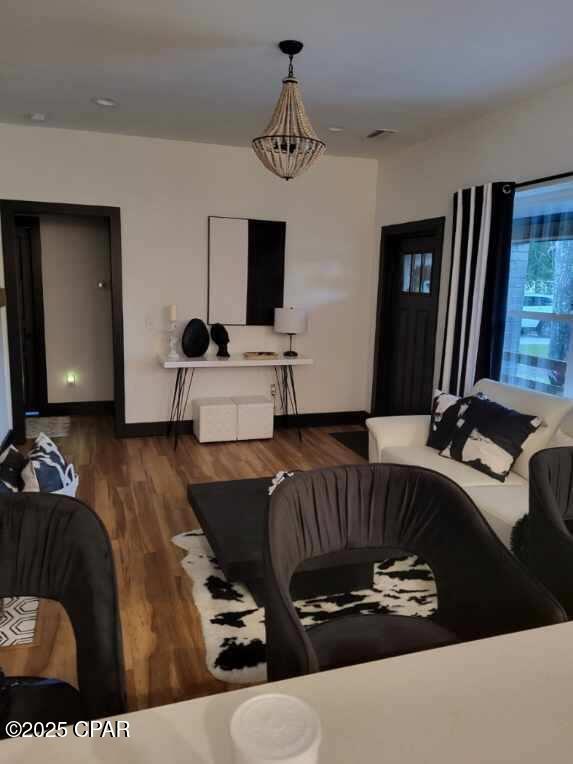 living room featuring dark wood-type flooring