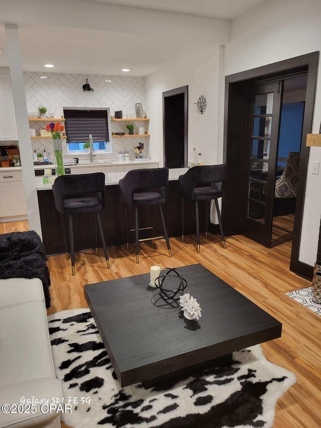 living room with light hardwood / wood-style floors