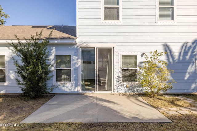 entrance to property with a patio area