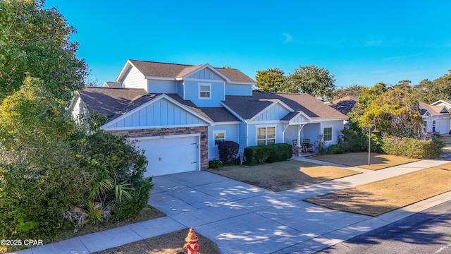 craftsman inspired home with a garage