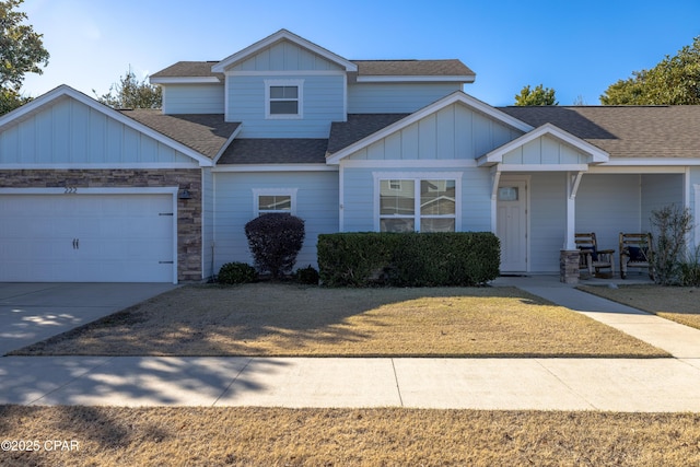 craftsman house featuring a garage and covered porch