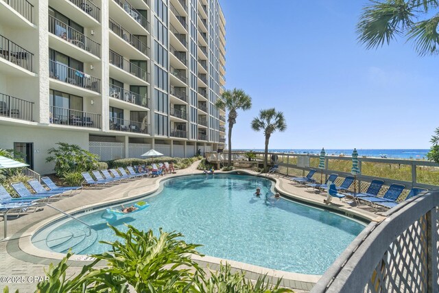 view of swimming pool featuring a patio area