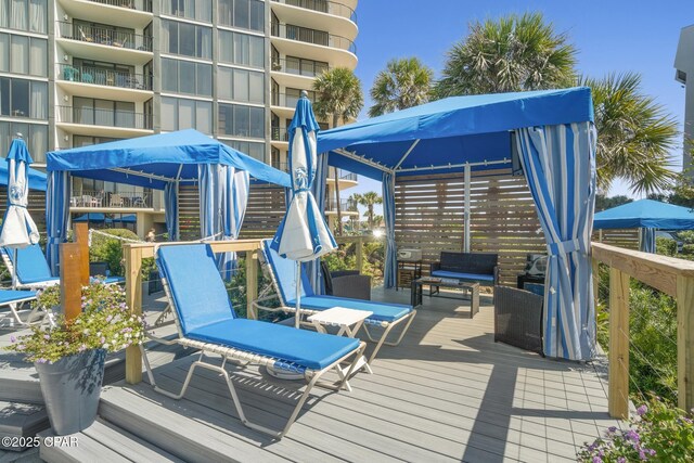 view of swimming pool featuring a water view and a patio area