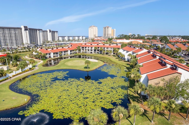 aerial view featuring a view of city and a water view