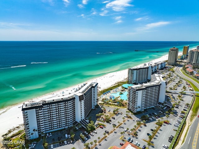 birds eye view of property with a city view, a view of the beach, and a water view