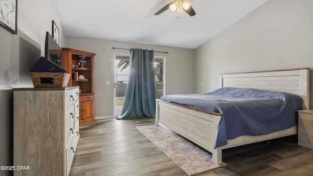 bedroom with lofted ceiling, ceiling fan, light wood-style flooring, and access to exterior