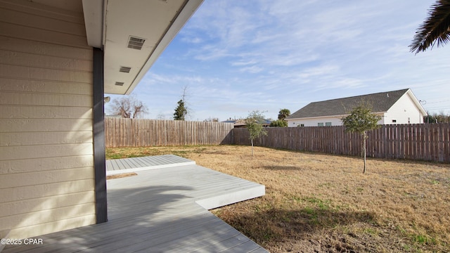 view of yard with a fenced backyard