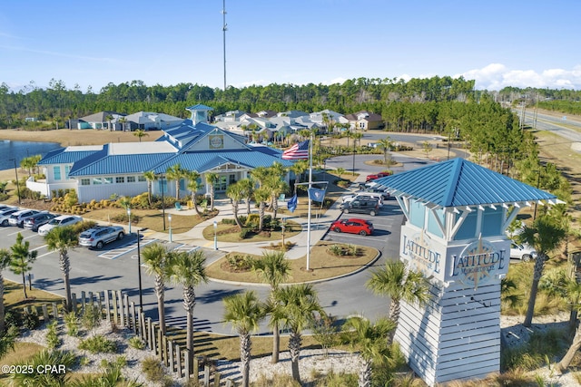 birds eye view of property with a residential view