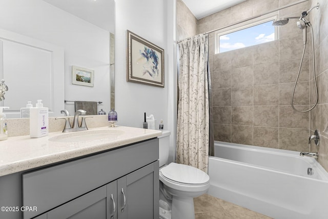 bathroom featuring tile patterned flooring, shower / bath combination with curtain, toilet, and vanity