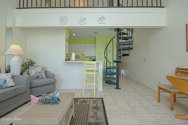 living room featuring light tile patterned floors