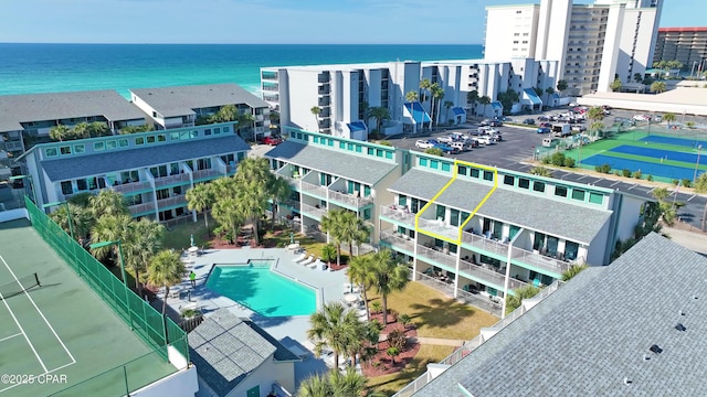 birds eye view of property featuring a water view