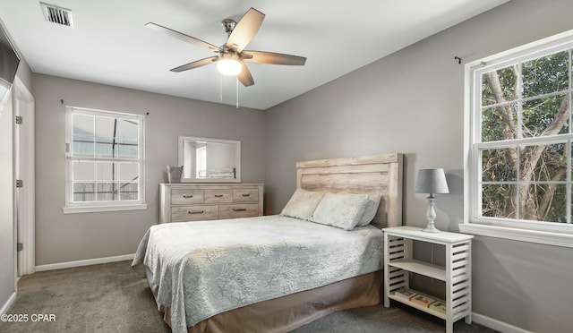 carpeted bedroom with ceiling fan