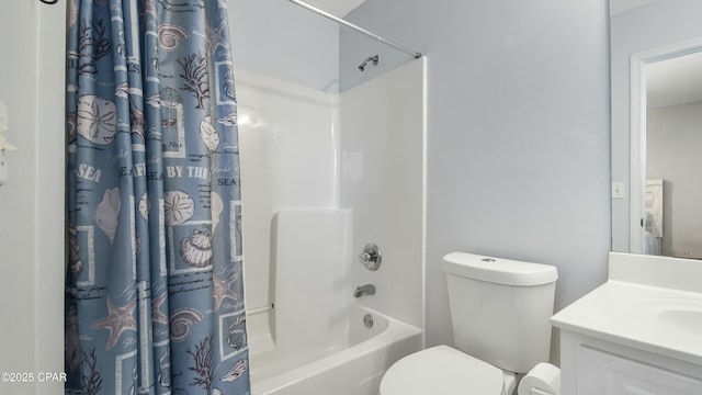 full bathroom with shower / tub combo with curtain, vanity, and toilet