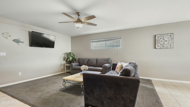 tiled living room with ceiling fan