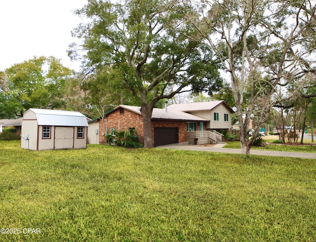 split level home with a garage and a front yard