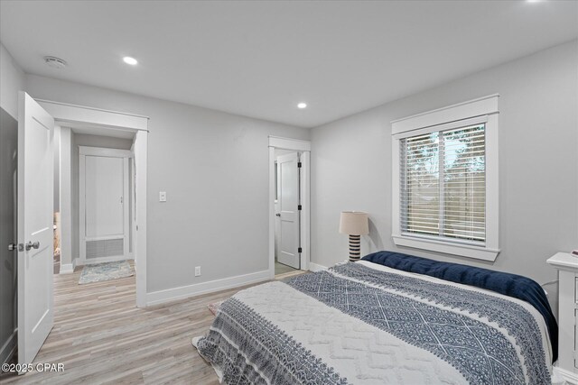 bedroom featuring light hardwood / wood-style flooring