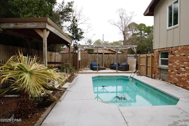 view of pool featuring a pergola, outdoor lounge area, and a patio