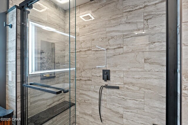 bathroom featuring an enclosed shower