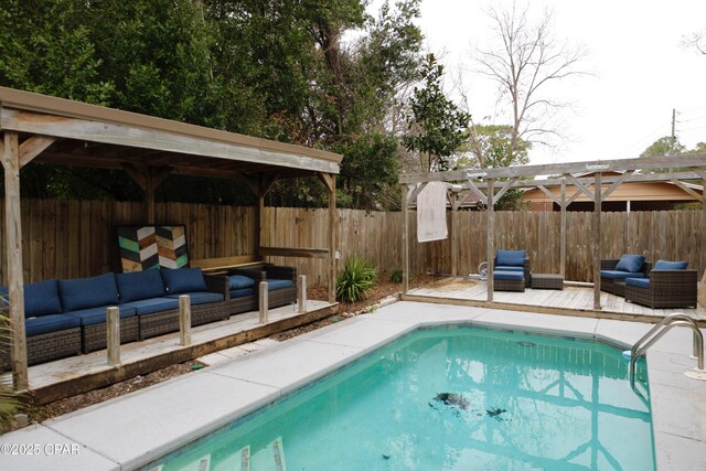 view of swimming pool with an outdoor living space