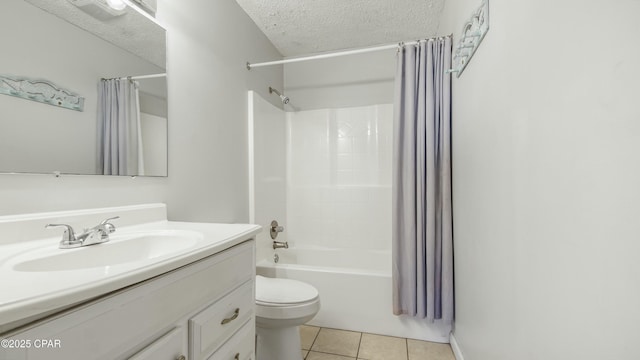 full bathroom with shower / tub combo with curtain, vanity, toilet, tile patterned floors, and a textured ceiling