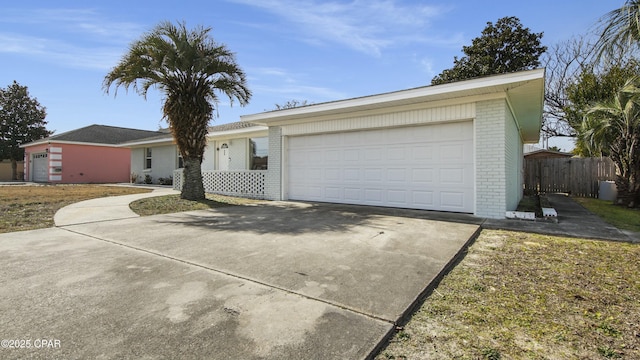 ranch-style home with a garage