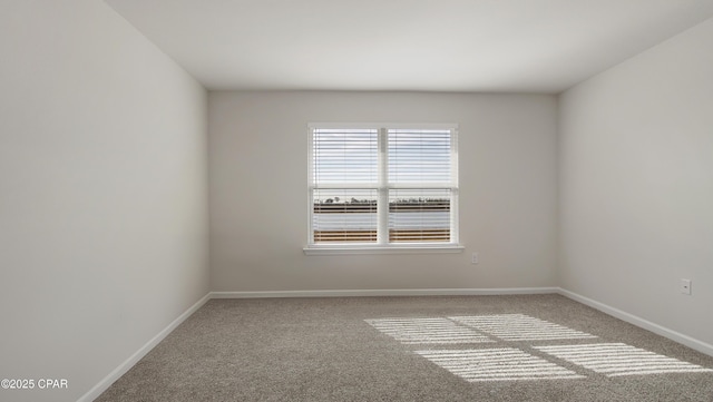 unfurnished room with carpet floors