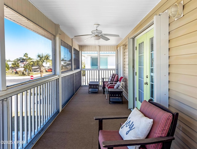 sunroom / solarium with ceiling fan