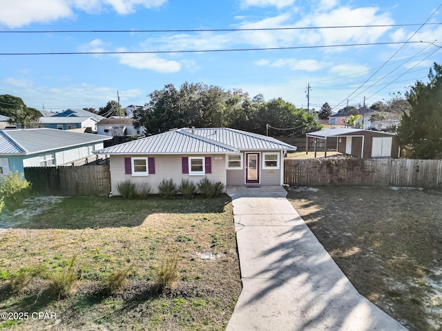 bungalow with a front lawn