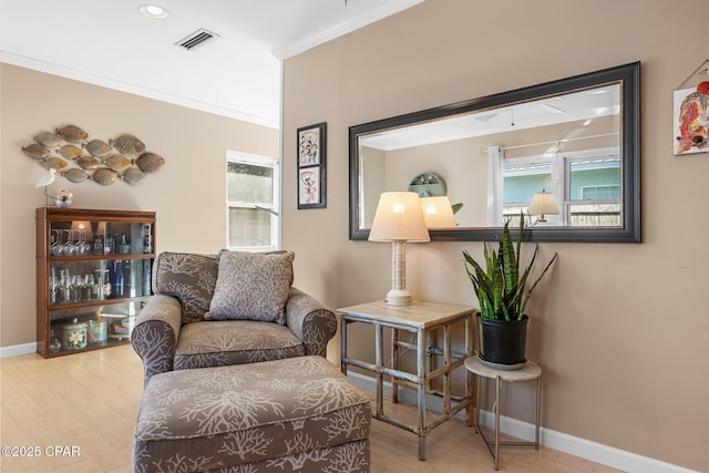 21823 Marlin Ave, Panama City Beach, FL 32413 - sitting room featuring crown molding, wood finished floors, and baseboards