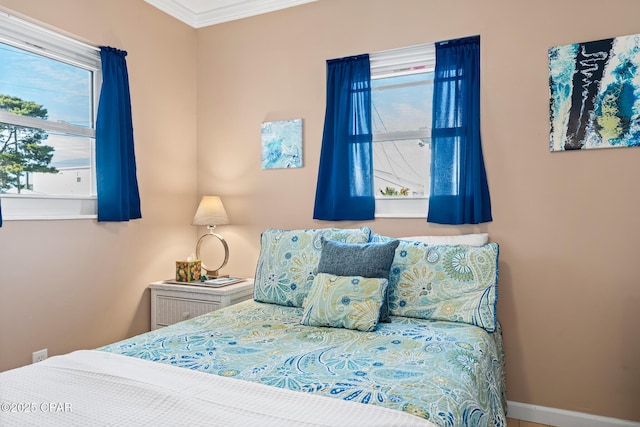 bedroom with crown molding