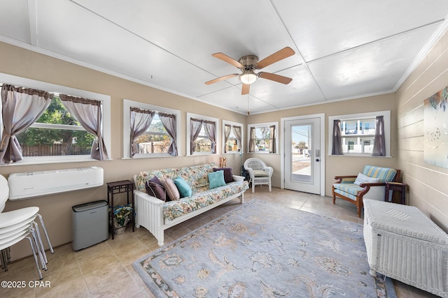 21823 Marlin Ave, Panama City Beach, FL 32413 - living area with healthy amount of natural light, a ceiling fan, crown molding, and tile patterned flooring
