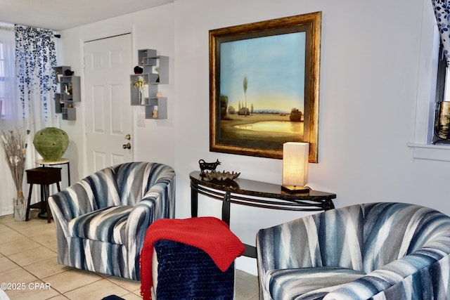 sitting room featuring light tile patterned floors