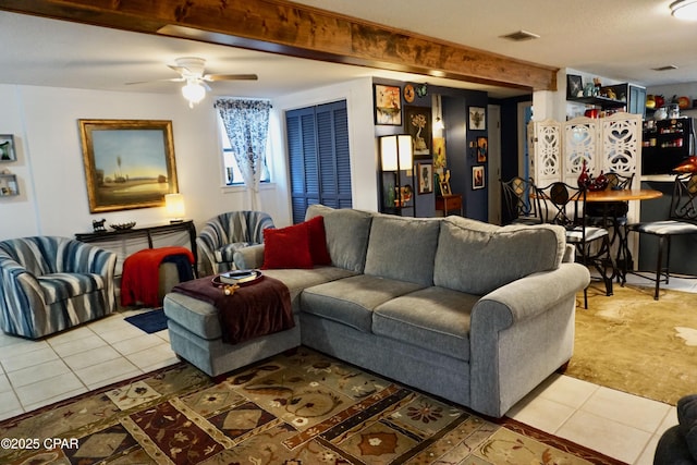 living room with light tile patterned flooring and ceiling fan