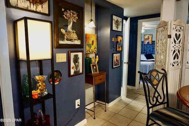 hallway featuring light tile patterned flooring