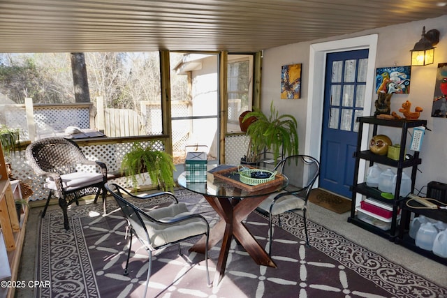 sunroom with wood ceiling