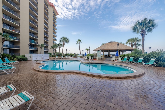 view of pool with a gazebo and a patio