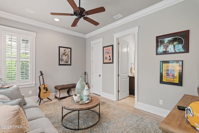 22207 Fox Glenn Trce, Panama City Beach, FL 32413 - living room featuring a ceiling fan, baseboards, crown molding, light wood-style flooring, and recessed lighting