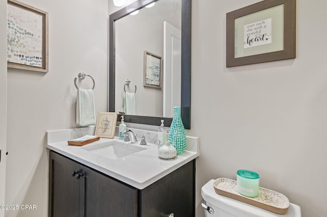 22207 Fox Glenn Trce, Panama City Beach, FL 32413 - half bathroom with vanity and toilet