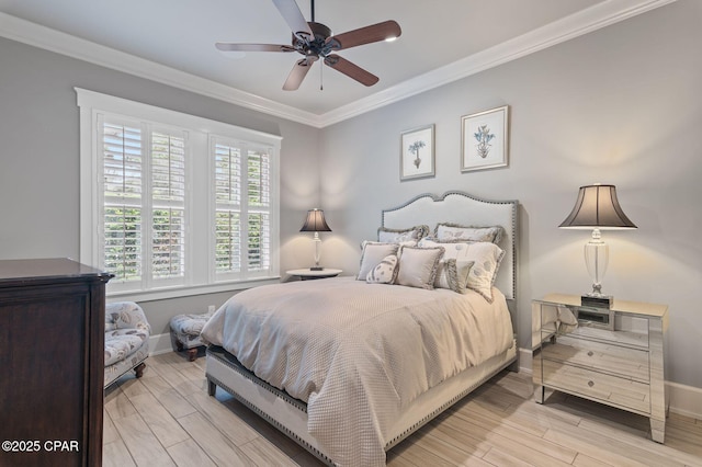 22207 Fox Glenn Trce, Panama City Beach, FL 32413 - bedroom featuring baseboards, ornamental molding, light wood-style floors, and a ceiling fan