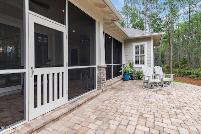 22207 Fox Glenn Trce, Panama City Beach, FL 32413 - view of patio featuring a sunroom