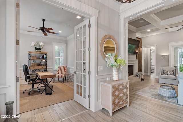 22207 Fox Glenn Trce, Panama City Beach, FL 32413 - interior space with a ceiling fan, crown molding, wood finished floors, recessed lighting, and a fireplace with raised hearth